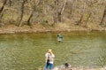 Fisherman Reeling in a Trout from the Roanoke River, Virginia, USA